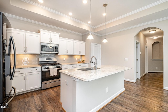 1164 Hudson Dr, Mebane, NC 27302 - kitchen featuring stainless steel appliances, dark wood-style flooring, backsplash, white cabinets, and ornamental molding