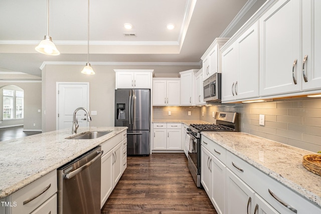1164 Hudson Dr, Mebane, NC 27302 - kitchen featuring appliances with stainless steel finishes, white cabinets, light stone countertops, tasteful backsplash, and crown molding