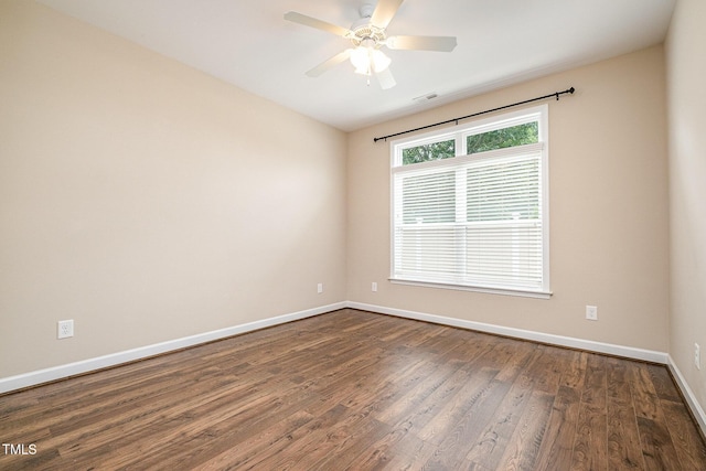 1164 Hudson Dr, Mebane, NC 27302 - unfurnished room with dark wood-type flooring and a ceiling fan