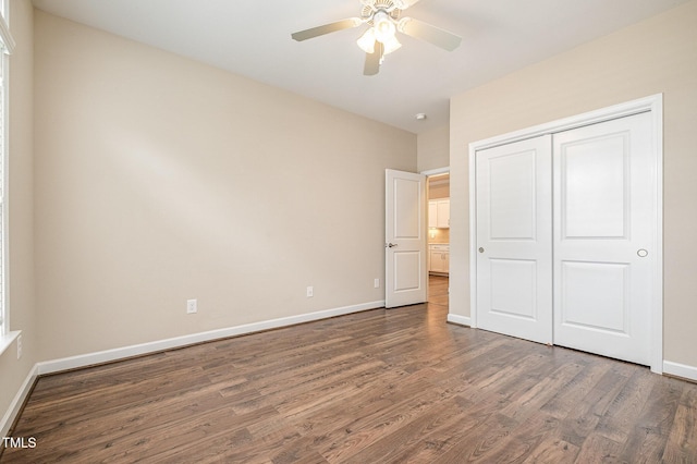 1164 Hudson Dr, Mebane, NC 27302 - unfurnished bedroom featuring dark wood-style flooring, a closet, and ceiling fan