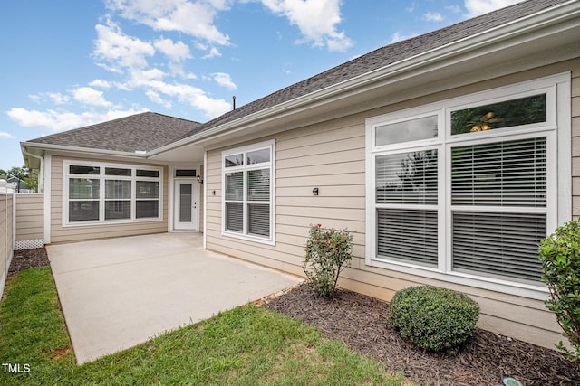 1164 Hudson Dr, Mebane, NC 27302 - back of house featuring a patio and roof with shingles