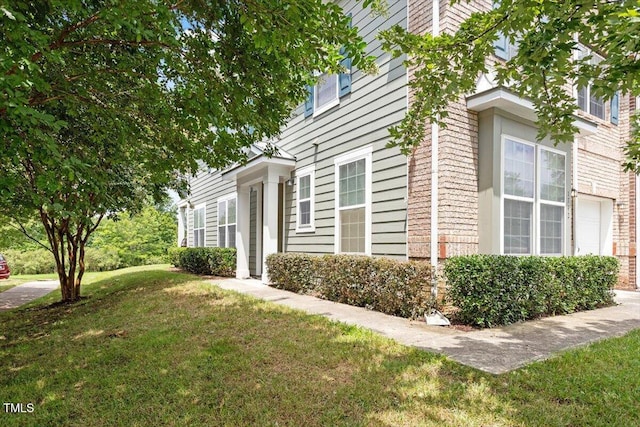 1742 Whirlaway Ct, Cary, NC 27519 - view of home's exterior with a lawn