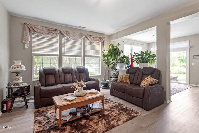 1742 Whirlaway Ct, Cary, NC 27519 - living room featuring light wood-type flooring and baseboards