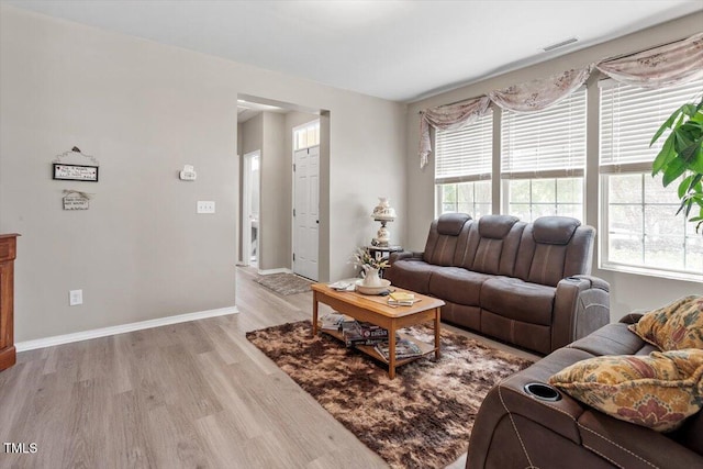 1742 Whirlaway Ct, Cary, NC 27519 - living area with light wood finished floors and baseboards