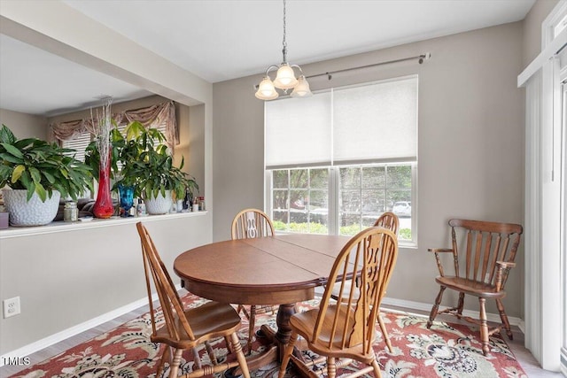 1742 Whirlaway Ct, Cary, NC 27519 - dining space featuring a chandelier and light wood-style flooring