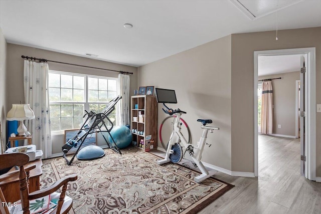 1742 Whirlaway Ct, Cary, NC 27519 - workout room with attic access and wood finished floors