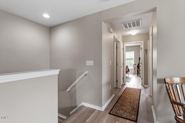 1742 Whirlaway Ct, Cary, NC 27519 - corridor featuring an upstairs landing and wood finished floors