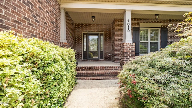 1019 Falkirk Dr, Burlington, NC 27215 - property entrance featuring brick siding and covered porch