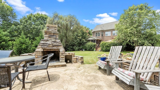 1019 Falkirk Dr, Burlington, NC 27215 - view of patio / terrace with an outdoor stone fireplace and outdoor dining space