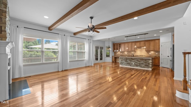 1019 Falkirk Dr, Burlington, NC 27215 - unfurnished living room with ceiling fan, beam ceiling, light wood-style floors, a fireplace, and recessed lighting