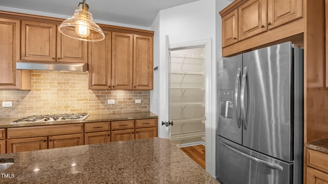1019 Falkirk Dr, Burlington, NC 27215 - kitchen featuring appliances with stainless steel finishes, dark stone countertops, and decorative backsplash