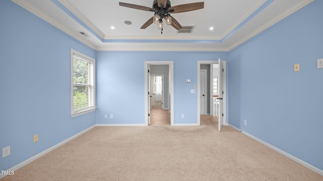 1019 Falkirk Dr, Burlington, NC 27215 - unfurnished bedroom featuring a tray ceiling, ornamental molding, light colored carpet, and recessed lighting
