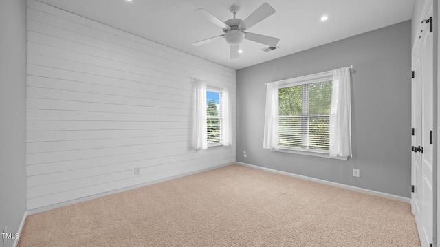 1019 Falkirk Dr, Burlington, NC 27215 - spare room featuring carpet floors, recessed lighting, and a ceiling fan