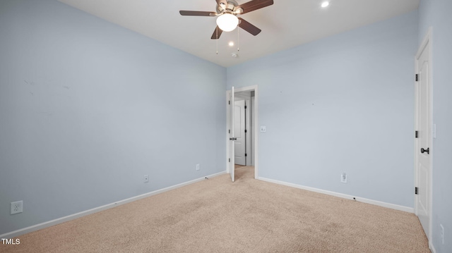 1019 Falkirk Dr, Burlington, NC 27215 - spare room featuring ceiling fan, light carpet, and recessed lighting