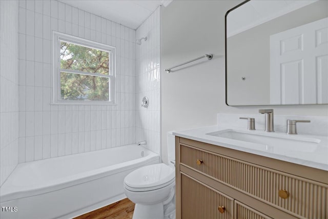 1109 Magnolia Dr, Durham, NC 27707 - full bathroom with vanity, shower / bathtub combination, and wood finished floors