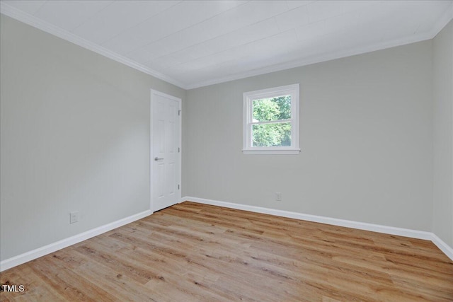 1109 Magnolia Dr, Durham, NC 27707 - spare room featuring crown molding and wood finished floors