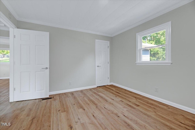 1109 Magnolia Dr, Durham, NC 27707 - unfurnished room with wood finished floors and crown molding