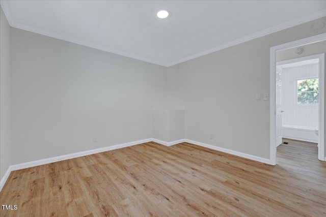 1109 Magnolia Dr, Durham, NC 27707 - empty room featuring crown molding, wood finished floors, and a smoke detector