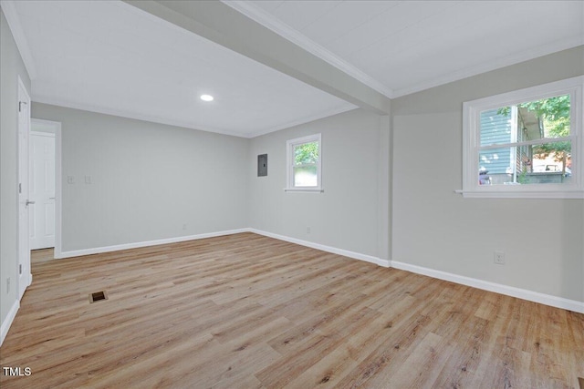 1109 Magnolia Dr, Durham, NC 27707 - unfurnished room with crown molding, light wood-type flooring, recessed lighting, and electric panel