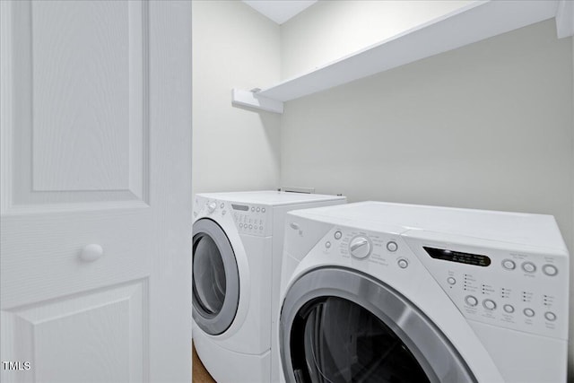 1109 Magnolia Dr, Durham, NC 27707 - laundry room with washer and clothes dryer