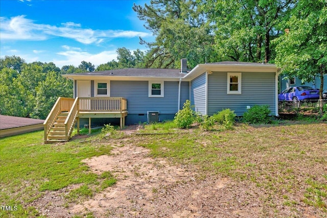 1109 Magnolia Dr, Durham, NC 27707 - back of house with a deck, a lawn, stairway, a chimney, and crawl space