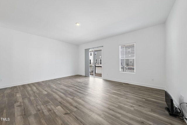 506 Village Branch Ln, Wake Forest, NC 27587 - spare room with wood finished floors and baseboards