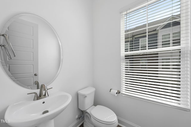 506 Village Branch Ln, Wake Forest, NC 27587 - bathroom with a sink and baseboards