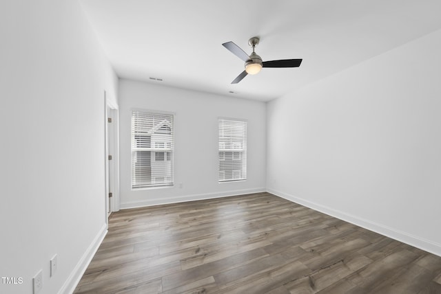 506 Village Branch Ln, Wake Forest, NC 27587 - unfurnished room with wood finished floors and ceiling fan