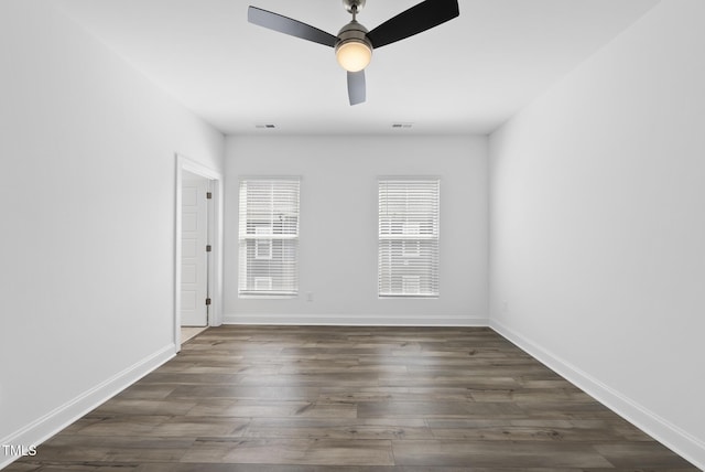 506 Village Branch Ln, Wake Forest, NC 27587 - unfurnished room with dark wood finished floors and ceiling fan