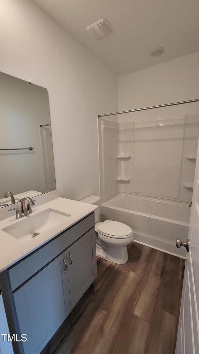 506 Village Branch Ln, Wake Forest, NC 27587 - full bathroom with vanity, wood finished floors, and shower / bathtub combination