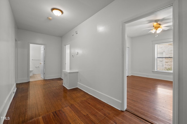 1309 Watts St, Durham, NC 27701 - empty room featuring dark wood-style floors and a ceiling fan