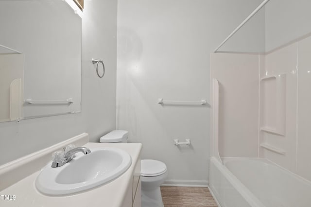 1309 Watts St, Durham, NC 27701 - full bathroom featuring tub / shower combination, vanity, and wood finished floors