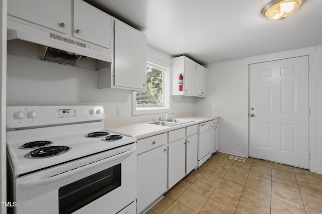 1309 Watts St, Durham, NC 27701 - kitchen featuring white appliances, under cabinet range hood, light countertops, white cabinetry, and light tile patterned floors