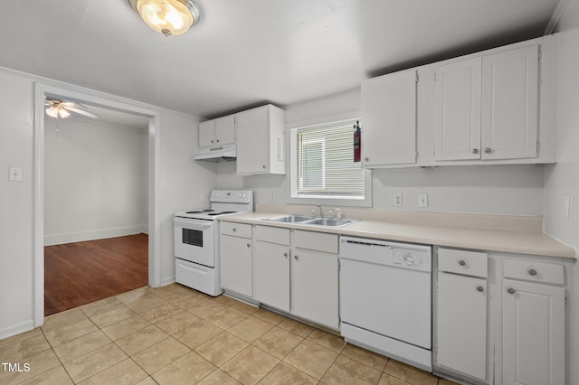 1309 Watts St, Durham, NC 27701 - kitchen featuring white appliances, white cabinetry, light countertops, and a ceiling fan