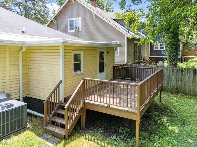 1309 Watts St, Durham, NC 27701 - back of house with a wooden deck, a chimney, and a shingled roof