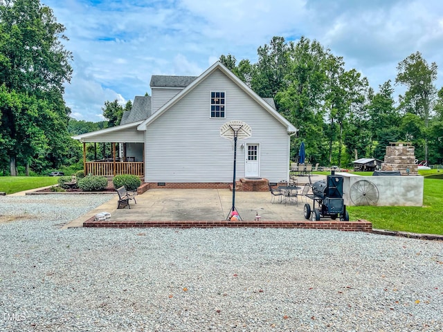 125 Al Gray Rd, Timberlake, NC 27583 - rear view of property with a patio and a shingled roof