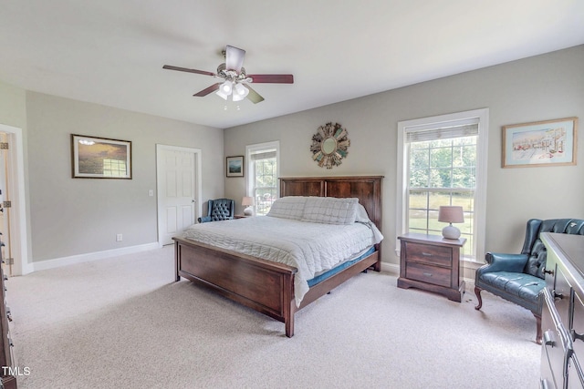 125 Al Gray Rd, Timberlake, NC 27583 - bedroom featuring light colored carpet, multiple windows, and ceiling fan