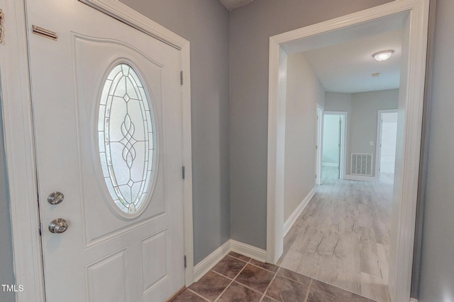 125 Al Gray Rd, Timberlake, NC 27583 - foyer entrance featuring baseboards and dark tile patterned flooring