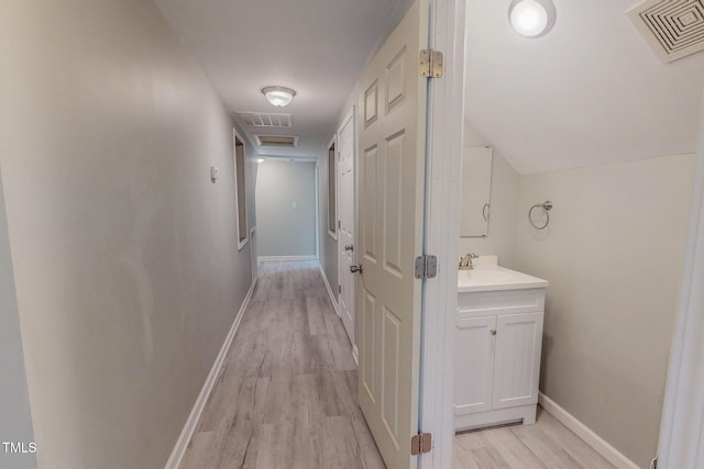125 Al Gray Rd, Timberlake, NC 27583 - corridor with light wood-type flooring and baseboards