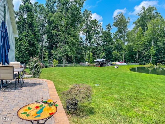 125 Al Gray Rd, Timberlake, NC 27583 - view of grassy yard with a patio