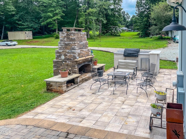 125 Al Gray Rd, Timberlake, NC 27583 - view of patio / terrace featuring an outdoor stone fireplace