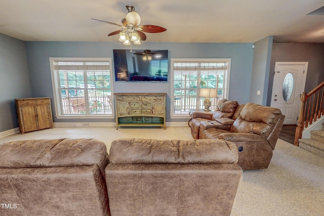 125 Al Gray Rd, Timberlake, NC 27583 - carpeted living area featuring plenty of natural light, a ceiling fan, and stairway