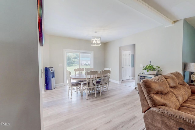 125 Al Gray Rd, Timberlake, NC 27583 - dining space with light wood-style floors, beam ceiling, a chandelier, and electric panel