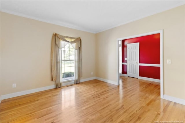 8017 Trout Creek Rd, Fayetteville, NC 28304 - spare room with ornamental molding and light wood finished floors