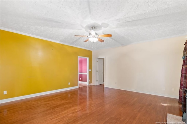 8017 Trout Creek Rd, Fayetteville, NC 28304 - unfurnished room with ceiling fan, wood finished floors, a textured ceiling, and crown molding