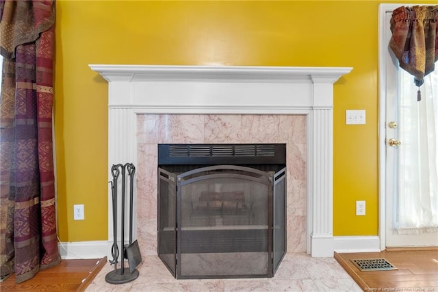 8017 Trout Creek Rd, Fayetteville, NC 28304 - detailed view of a tile fireplace and baseboards