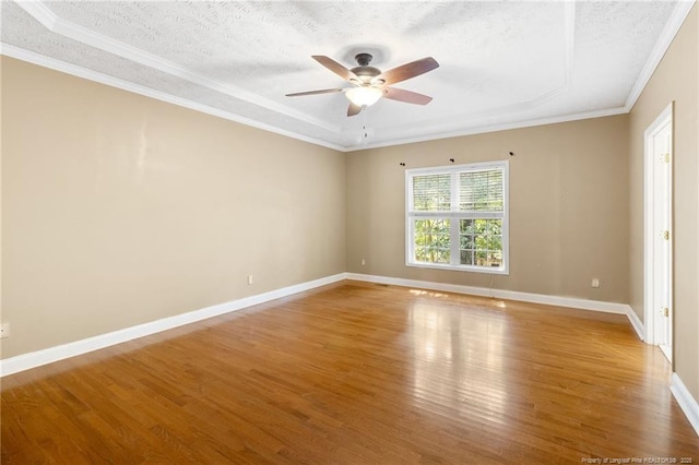 8017 Trout Creek Rd, Fayetteville, NC 28304 - empty room featuring wood finished floors, a ceiling fan, a textured ceiling, and ornamental molding