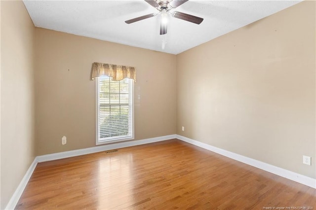 8017 Trout Creek Rd, Fayetteville, NC 28304 - spare room featuring wood finished floors and ceiling fan