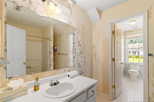 8017 Trout Creek Rd, Fayetteville, NC 28304 - bathroom with vanity, tile patterned flooring, a shower with shower curtain, and a textured ceiling