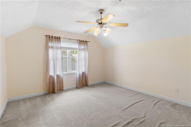 8017 Trout Creek Rd, Fayetteville, NC 28304 - additional living space with lofted ceiling, a textured ceiling, carpet flooring, and ceiling fan